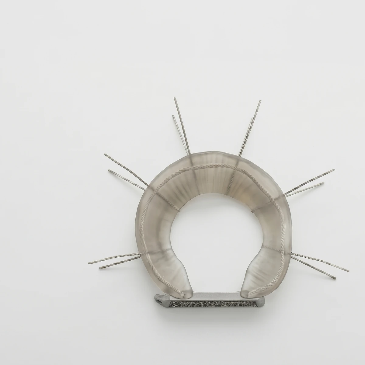 Top-down LunaFlex Meniscus design render showing the complete C-shaped implant, fixation bridge and all peripheral suture threads.